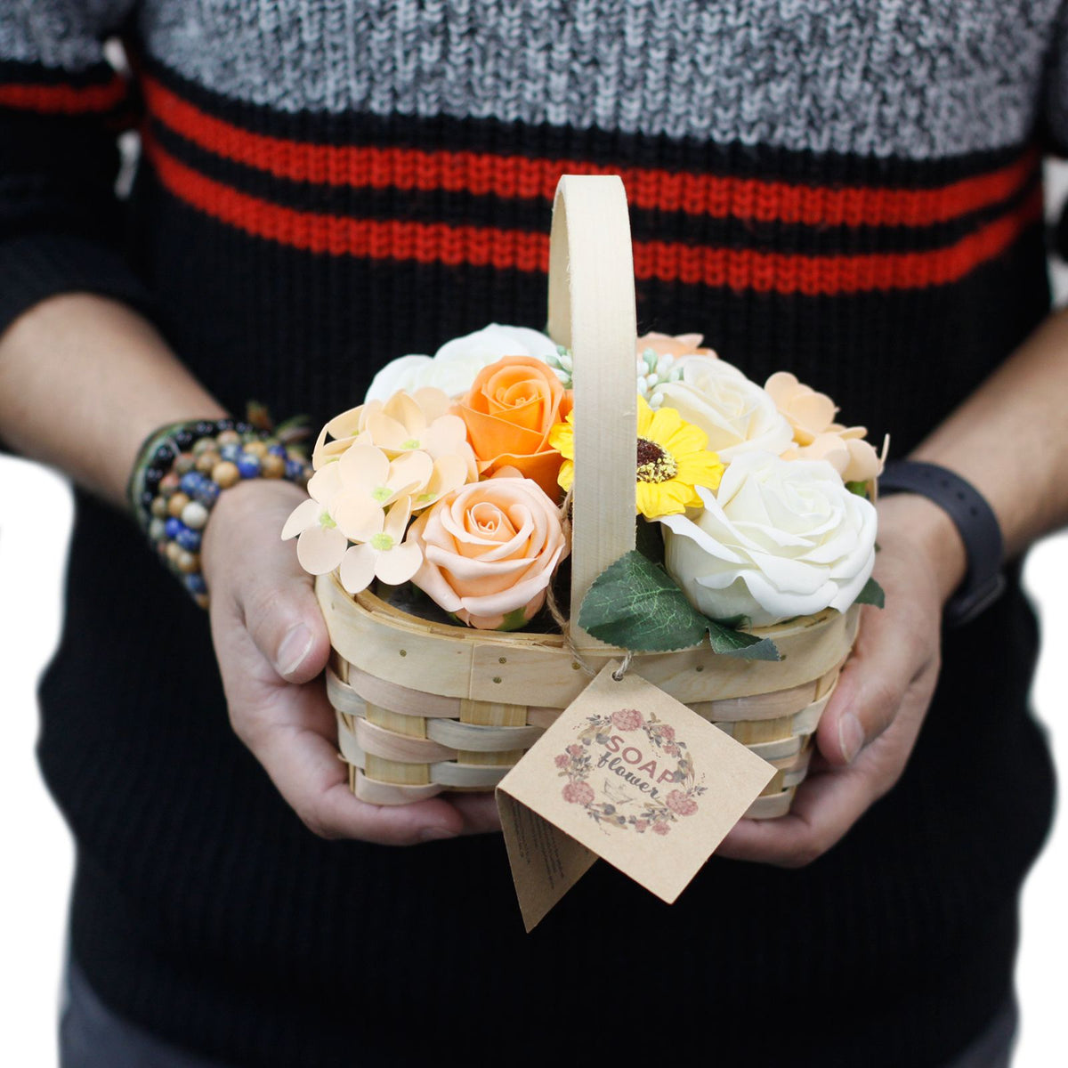 Medium orange soap flower bouquet in wicker basket