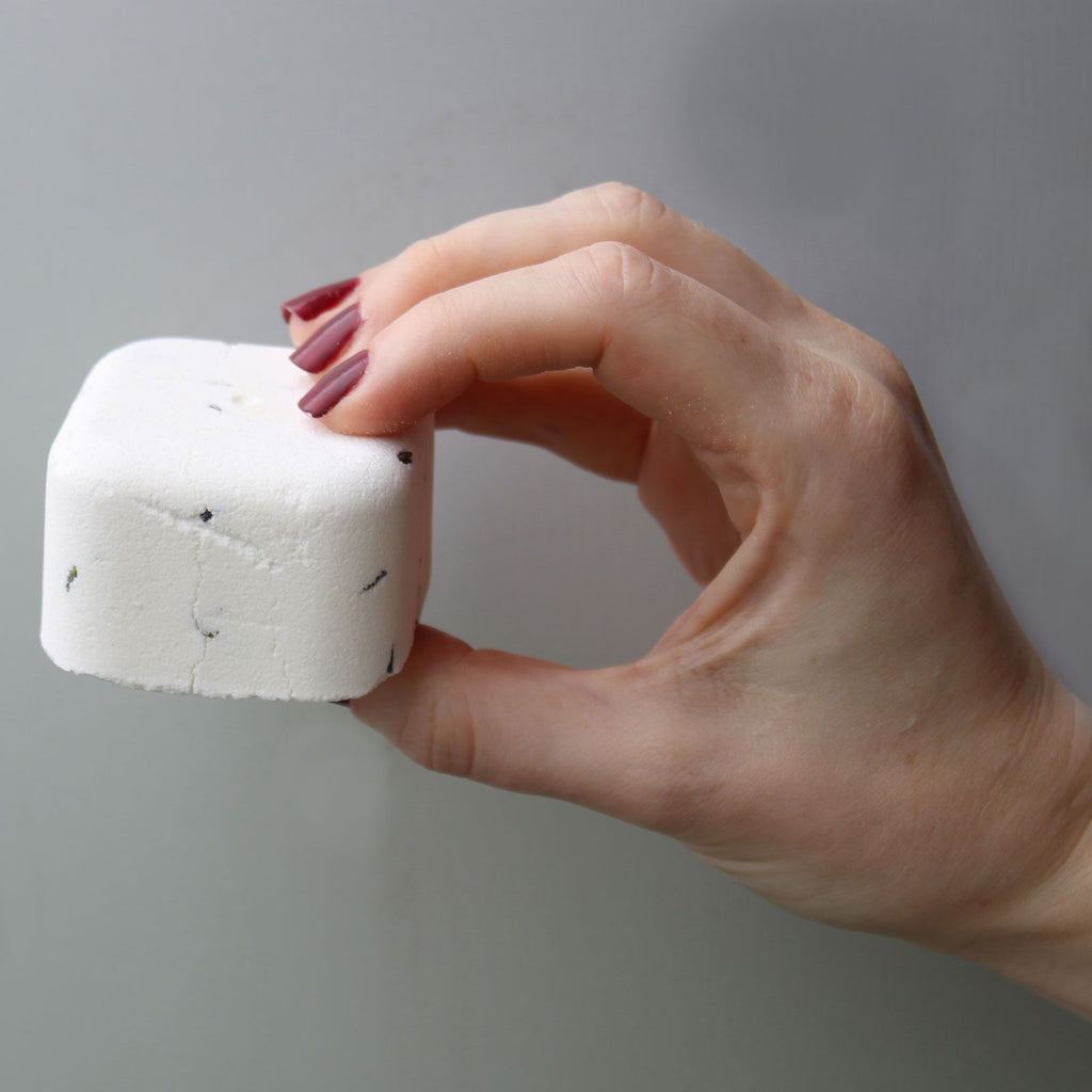 Deep Sleep aromatherapy shower steamers included in the Poise Deep Sleep Ritual