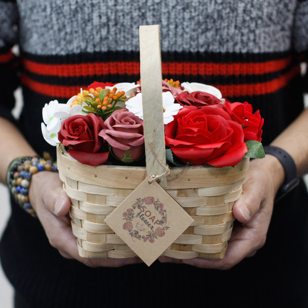 Large pink soap flower bouquet in wicker basket