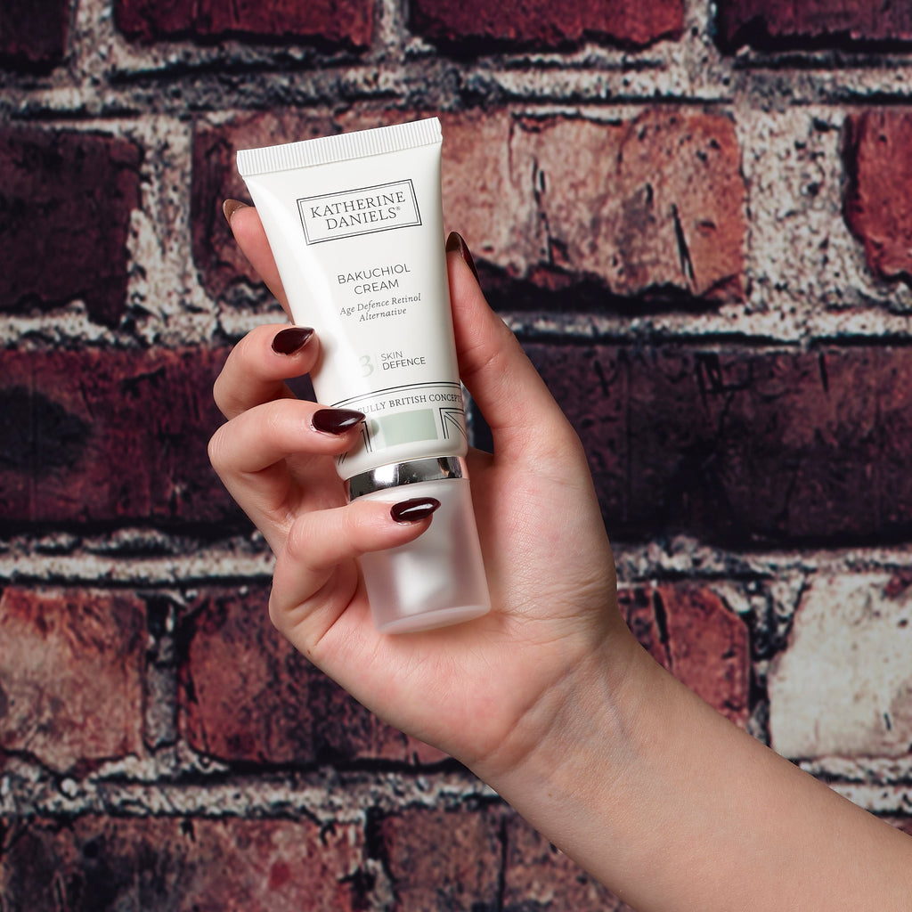 Katherine Daniels Bakuchiol Cream held in hand