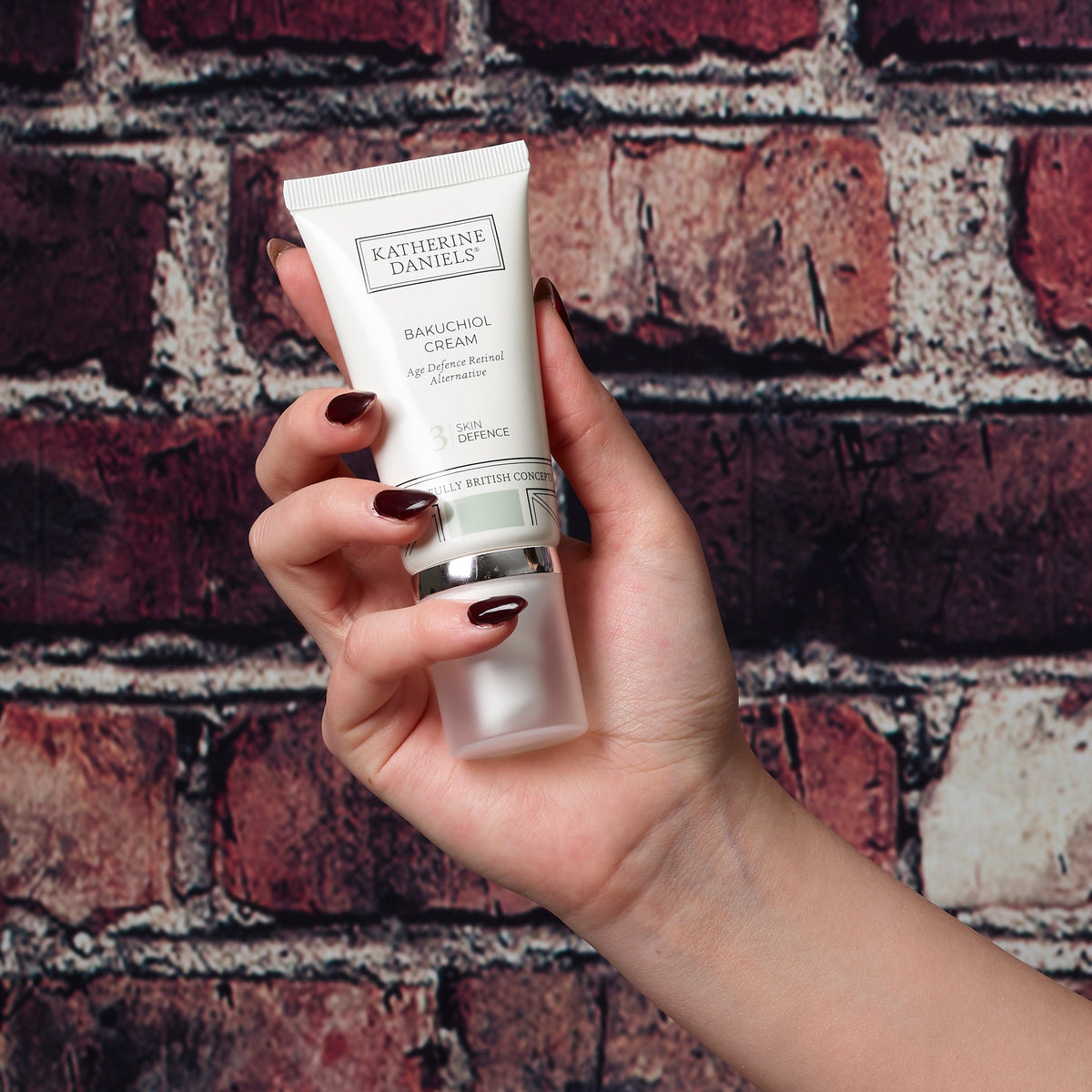 Katherine Daniels Bakuchiol Cream held in hand