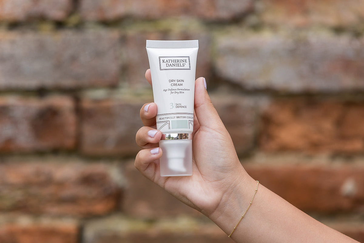 Katherine Daniels Dry Skin Cream held in hand