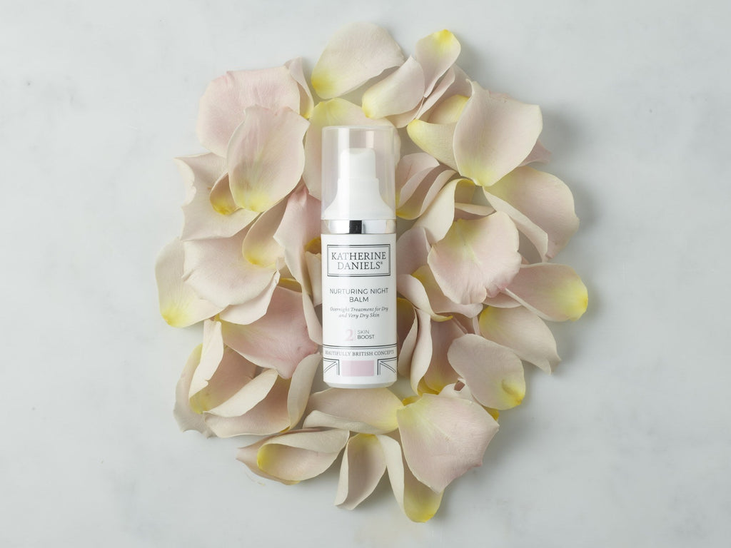 Katherine Daniels Nurturing Night Balm lifestyle with petals