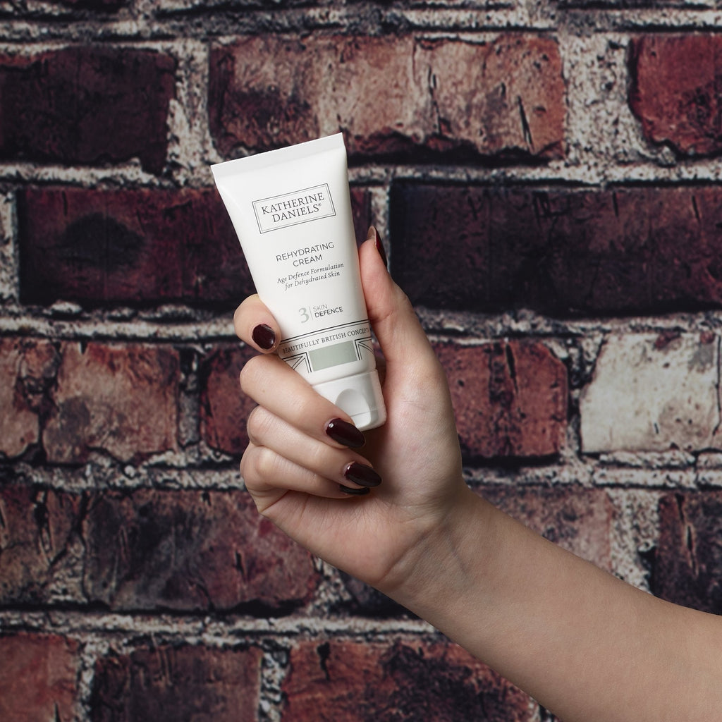 Katherine Daniels Rehydrating Cream held in hand